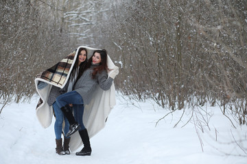 Beautiful girl in a beautiful winter park