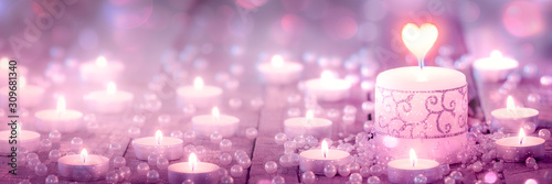Candle With Lace And Heart Shaped Flame On Wooden Floor With Tea Lights And Pearls - Valentine's Day Concept