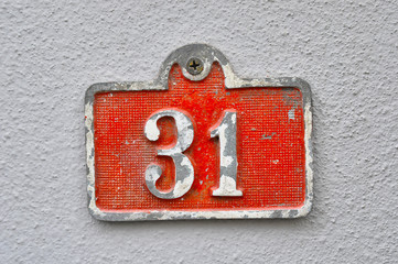 Wall Mural - A house number plaque, showing the number thirty one (31)