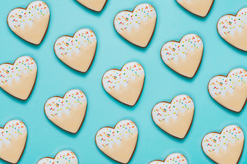 Wall Mural - Heart shape cookies on blue background