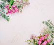 © lithiumphoto - Frame of flowers on white marble background with copy space