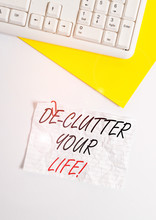 Text Sign Showing De Clutter Your Life. Business Photo Showcasing Remove Unnecessary Items From Untidy Or Overcrowded Places Flat Lay Above White Blank Paper With Copy Space For Text Messages