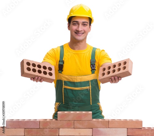 Cuadros en Lienzo The handsome construction worker building brick wall