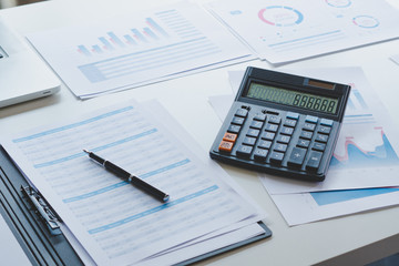 Fototapete - businessman working calculate data document graph chart report marketing research development  planning management strategy analysis financial accounting. Business office concept.