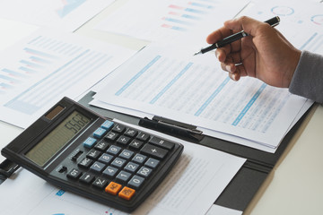 Poster - businessman working calculate data document graph chart report marketing research development planni