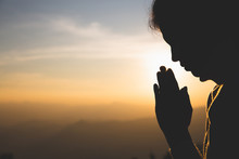 Silhouette Of A Woman  Praying Hands With Faith In Religion And Belief In God On The Morning Sunrise Background.  Namaste Or Namaskar Hands Gesture, Pay Respect, Prayer Position.