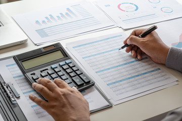 Poster - businessman working calculate data document graph chart report marketing research development planni