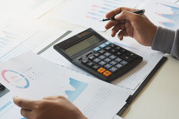 Poster - businessman working calculate data document graph chart report marketing research development planni