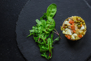 vegetable salad, traditional olivier (healthy eating potatoes, carrots, peas and more) menu concept. food background. top view. copy space