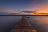 Fototapeta  - Glowing dawn over the lake