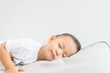© MIA Studio - Toddler boy sleeping in sofa and dream.Asian 2 years old baby boy sleep on the sofa in living room.Sleep time,Comfortable, peaceful and growth hormone concept.