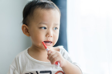 Wall Mural - kid brushing teeth.2 years old little asian toddler boy brush teeth.dentistry and oral care concept.