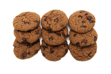 Biscuit with chocolate chip flavored. A stack of crunchy delicious sweet meal and useful cookie. Isolated on white background.