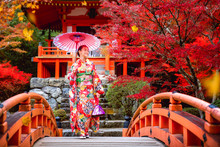 Japanese Girl In Kimono Traditional Dress Walk In Red Bridge