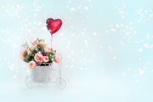 Retro Bicycle With Basket Of Pink Flowers And Heart-shaped Balloon On Festive Light Magic Background. Concept For Valentine's Day, Mother's Day And Women's Holiday