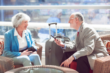 Elderly couple of travelers