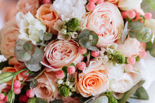 Wedding Flowers, Bridal Bouquet Closeup. Decoration Made Of Roses, Peonies And Decorative Plants