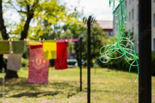 Fotomural Clothesline with laundry that dries outdoors in the sun, Clothesline with laundr