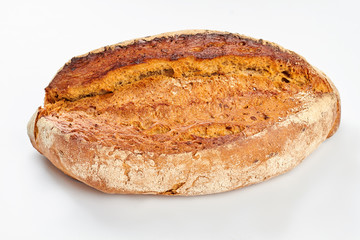 Fresh homemade bread on white background. Traditional wheat bread. Healhy homemade food.