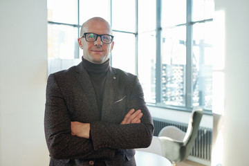 Aufkleber - Bald successful well-dressed mature businessman with arms crossed on chest