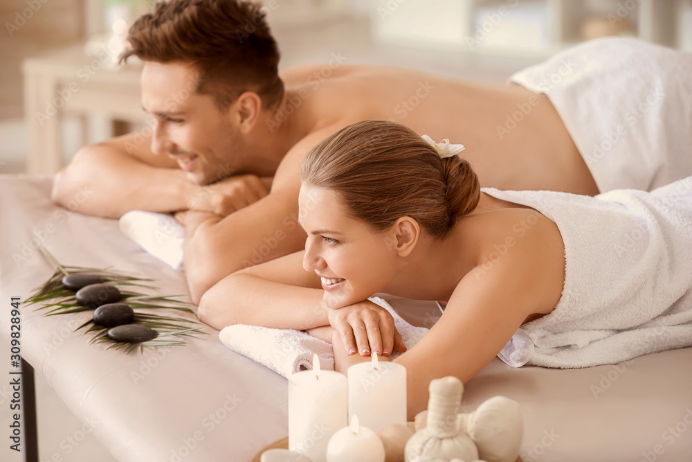 Young couple relaxing in spa salon