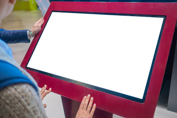 Mock up, copyspace, template, isolated, white screen, futuristic concept. Mockup: woman looking at blank white interactive touchscreen display of electronic kiosk at technology exhibition, museum