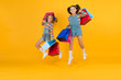 © be free - Online shop. happy shopaholic children. little girls care packages. free jump. Summer shopping. Buyer consumer concept. Holiday purchase saving. small kids with heavy shopping bags. big sale presents