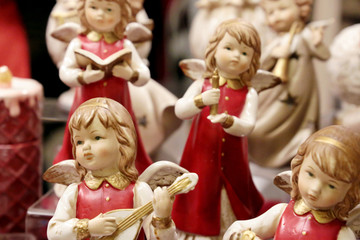 Wall Mural - Porcelain figurines of angels, souvenir at the Christmas fair in England