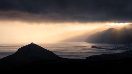 sunset after the storm over madeira coastline