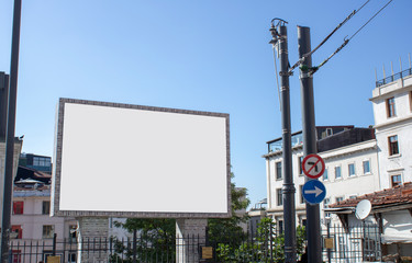 Close-up advertising sign. In white background. Photographed on a summer day.