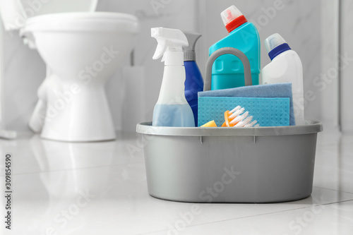 Fotomural Cleaning supplies and toilet bowl in bathroom
