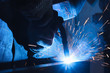 © InWay - factory welder welds parts with a semi-automatic welding machine