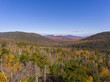 White Mountain National Forest fall foliage on Kancamagus Highway near Kancamagus Pass at Wangan Overlook aerial view, Town of Lincoln, New Hampshire NH, USA.