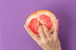 © alexxndr - fruit composition fingers in grapefruit