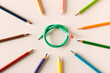 Colored pencils with one flexible pencil on white background. The concept of flexibility in decision-making.