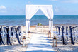 Blue themed wedding setup at the white sandy beach. Romantic getaway wedding. Horizontal