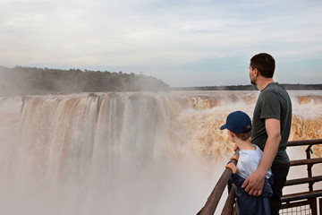 family enjoying iguazu falls