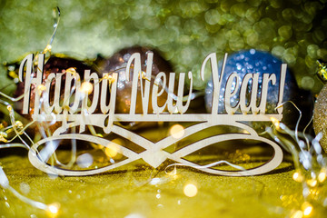 Happy New Year on a gold shiny background