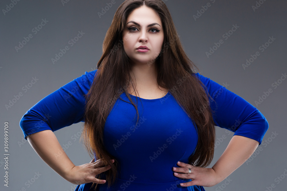 knee length dresses for ladies Large Seated Fat Lady With Dark Blue Floral Dress