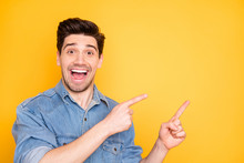 Photo Of Excited Ecstatic Overjoyed Man Screaming Pointing Into Empty Space At Sales With Astonishment On Face Isolated Vivid Color Background