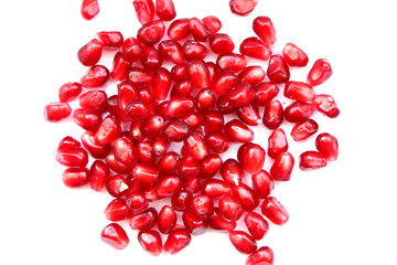 pomegranate seeds isolated on white background, top view