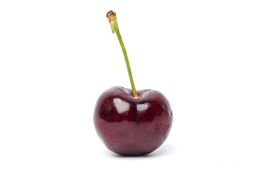 Fresh cherry isolated on white background.