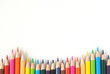 Fototapeta Tęcza - Color pencils on white background