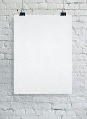 Poster - White blank poster on wall.