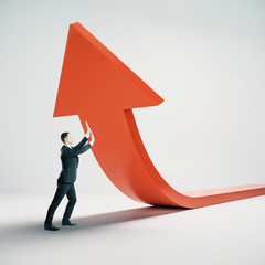 Aufkleber - Businessman holding red arrow.