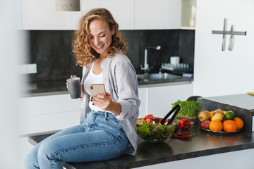 Wall Mural - Smiling young woman wearing casual clothes