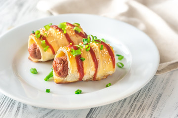 Poster - Sausage rolls on the white plate