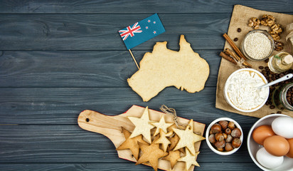 Wall Mural - cooking patriotic cookies, gingerbread in shape of Australia. Celebrate Australia Day holiday on January 26