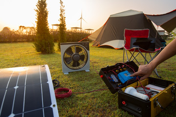 camping solar panels installed elements equipment with power box and lamp for facilitate camping.