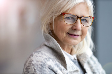 Portrait of senior woman wearing glasses